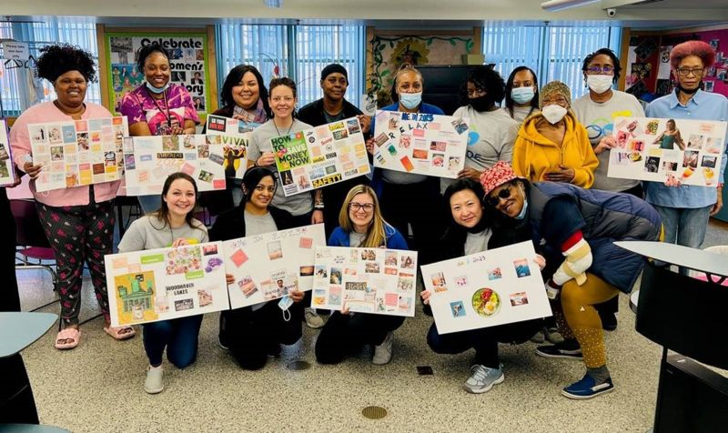 Alliant Credit Union volunteers with Deborah's Place residents and their vision boards on International Women's Day