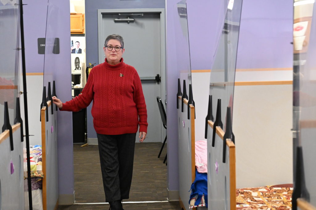 Audrey Thomas stands in Teresa's Interim Housing