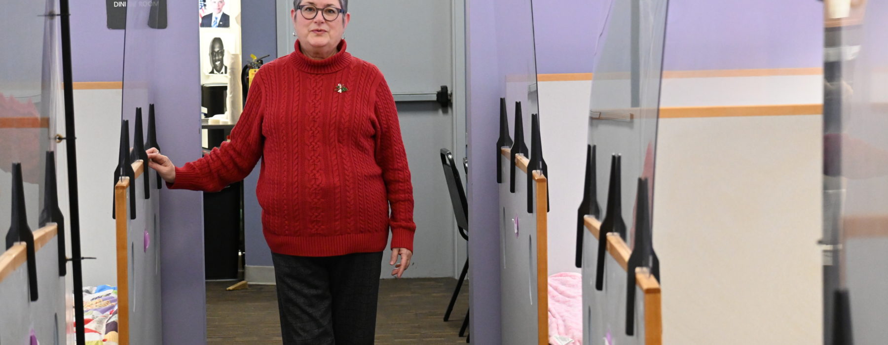 Audrey Thomas stands in Teresa's Interim Housing