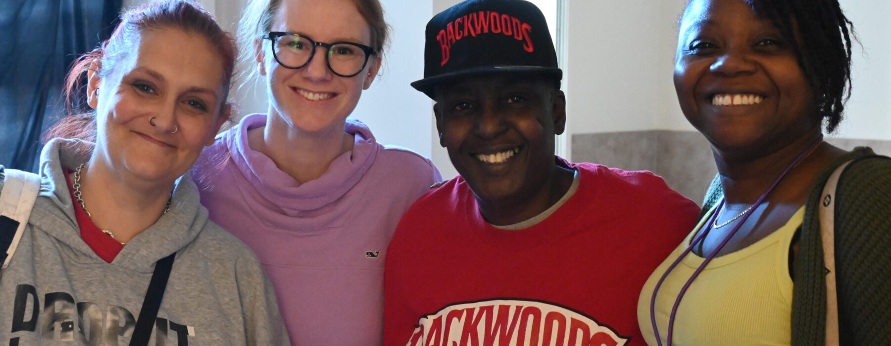 Catelyn with Deborah's Place staff and another alumna