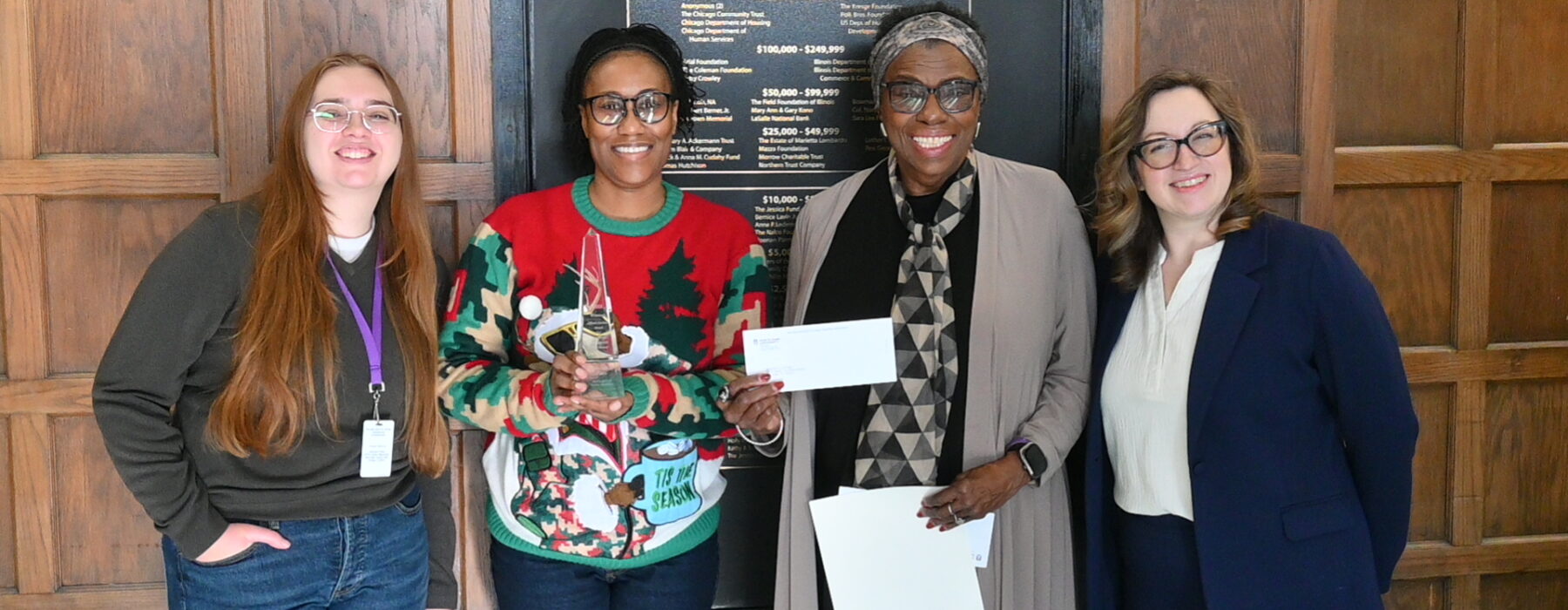 Representatives from Deborah's Place accept the Alford-Axelson Award for Nonprofit Managerial Excellence